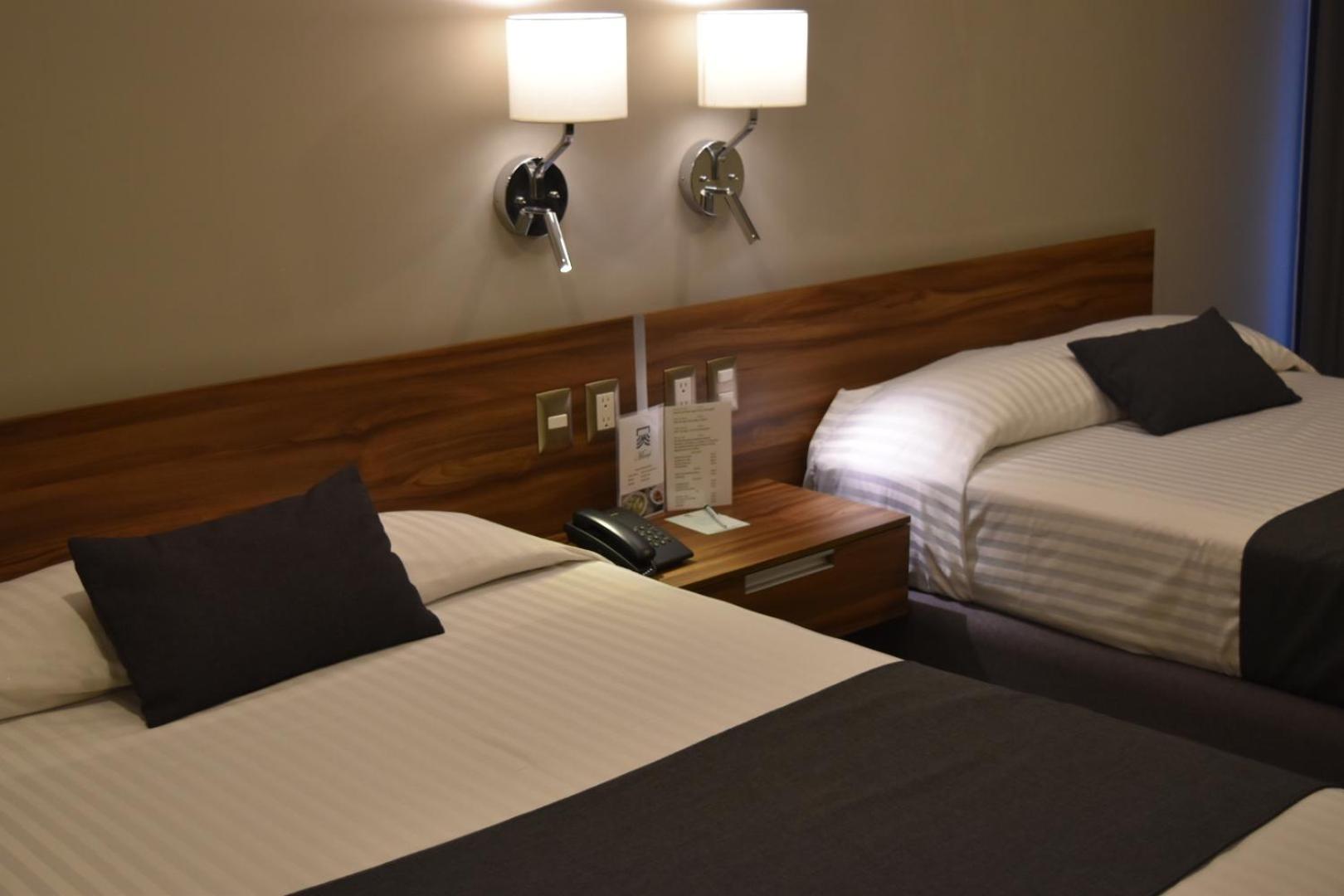 Estanza Hotel & Suites Морелия Номер фото